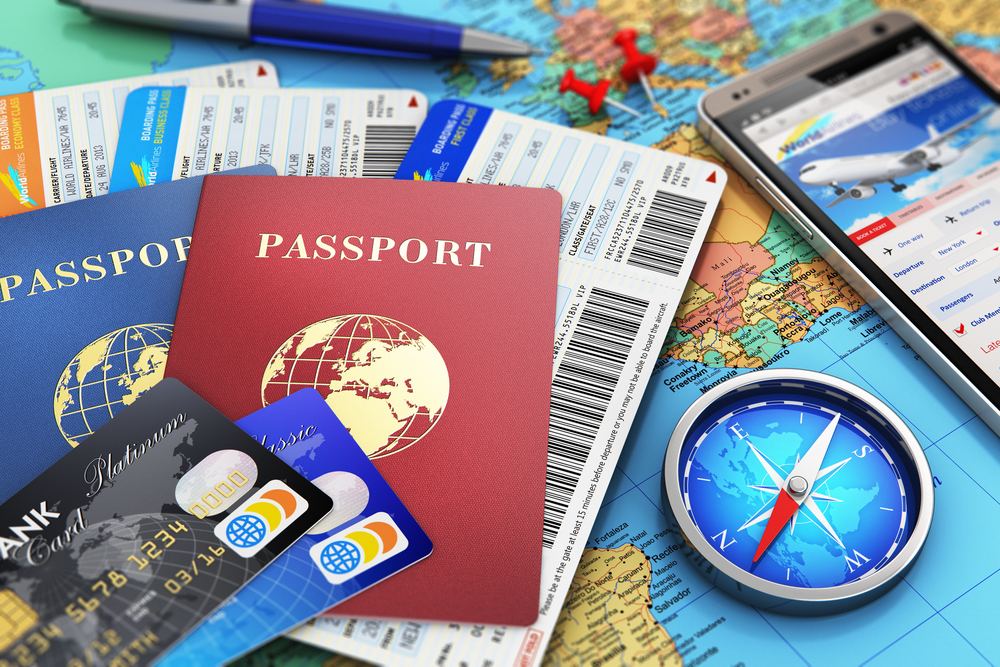 Passports, bank cards and a map ready for a trip