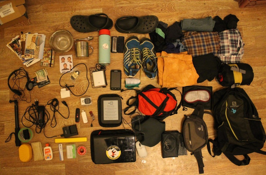 Kilimanjaro climbing gear laid out on a wooden floor